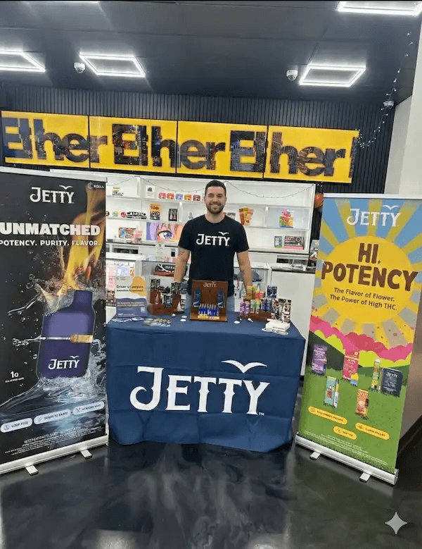 Brand ambassador engaging with customers at cannabis event