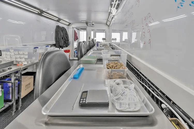 Pre-roll manufacturing workstation and equipment setup